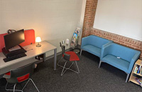 family room with computer and desk