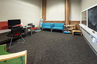 family room with computer and desk